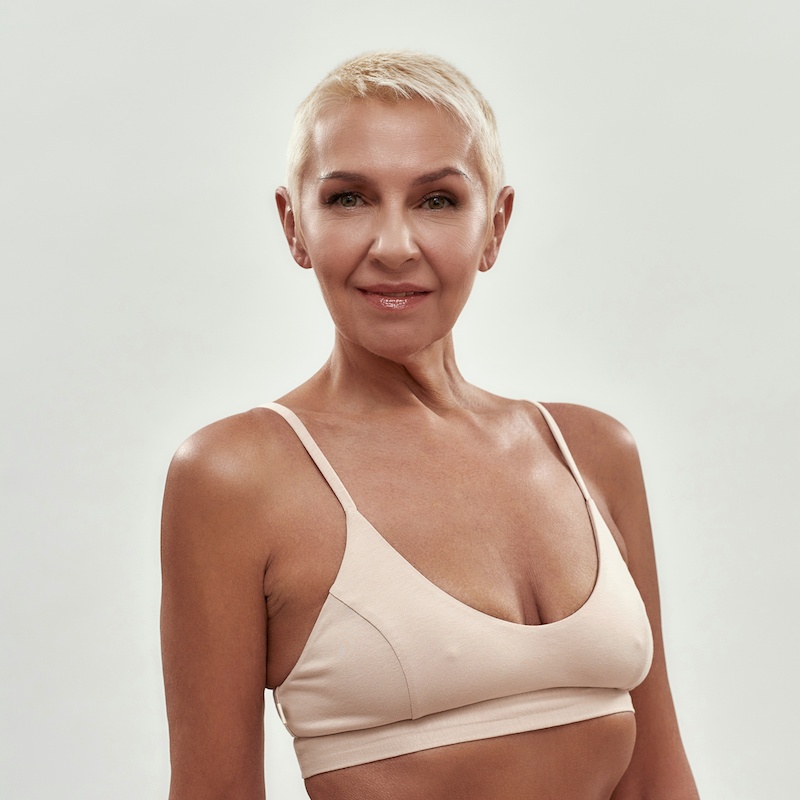 beautiful older woman in nude bra