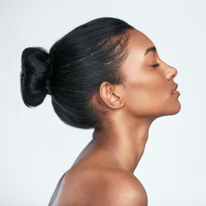 beautiful young woman with her eyes closed